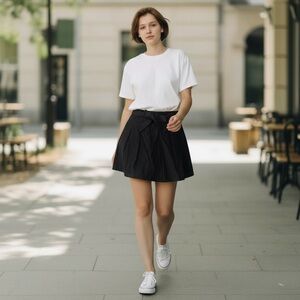 Vintage theory mini black with bow skirt size 8